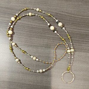 Necklace with ring for holding keys, glasses or badge